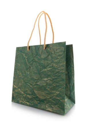 Close up of blank dark green nacre gift bag with raised handles.の写真素材