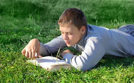 boy with a bookの写真素材