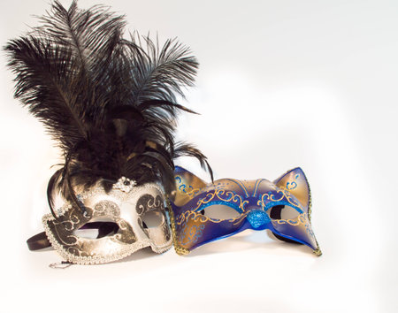Two Venetian carnival masks over white backgroundの写真素材