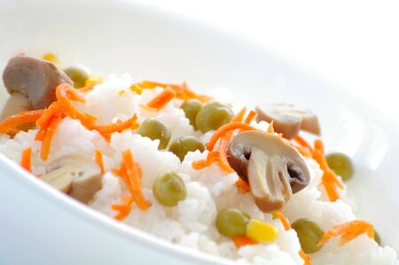 Plate with the rice and the vegetables by the closeupの写真素材