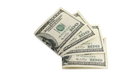 One hundred dollar notes against the white backgroundの写真素材