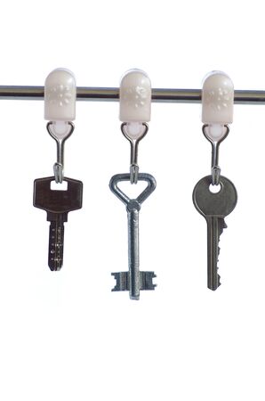 Key from the house, isolated against the white backgroundの写真素材