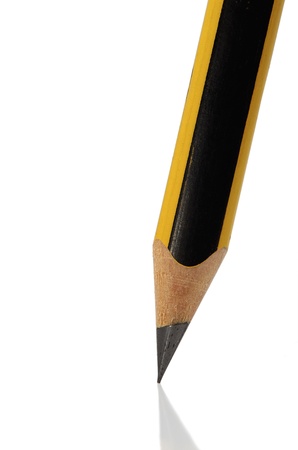 Simple pencil by closeup against the white backgroundの写真素材