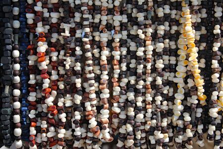 Background from multi-colored coral beadsの写真素材