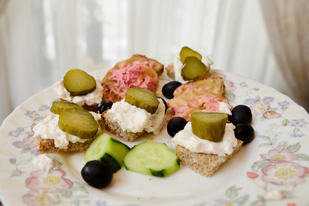 small sandwiches with cheese and cucumberの写真素材