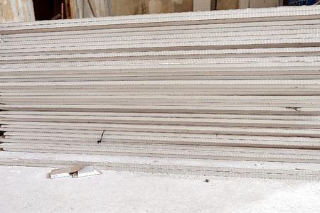 photo of a stack of drywall from close rangeの写真素材