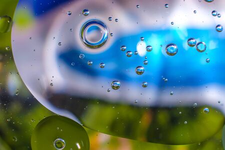 colorful background from water drops and oil