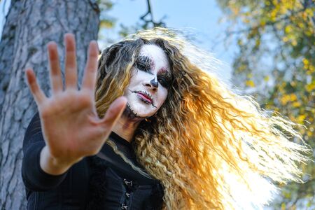 the witch in the dark forest on Halloween