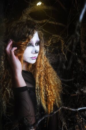 the witch in the dark forest on Halloween