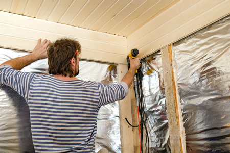 worker making repairs in a city apartmentの写真素材