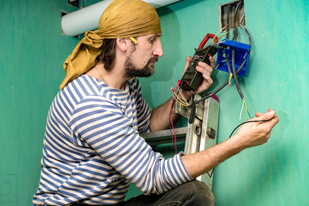 workers make repairs in the apartmentの写真素材
