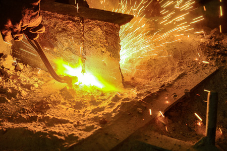 the welder welds metal structuresの写真素材