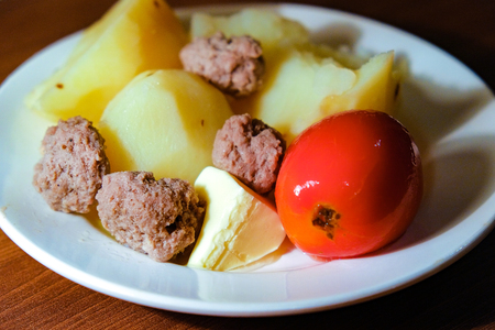 potatoes with meat and tomatoの写真素材