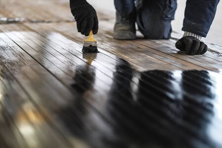 Worker paints the metalの写真素材