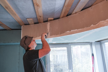 worker making repairs in a country houseの写真素材