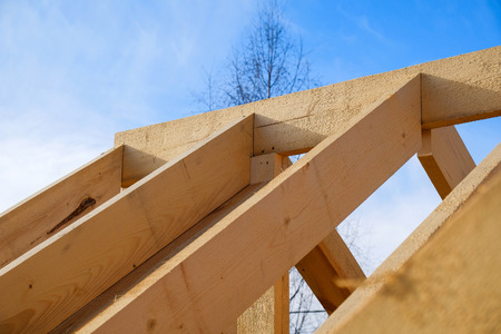 construction of a two-storey frame house outside the city