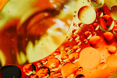 colorful background from water drops and oilの写真素材