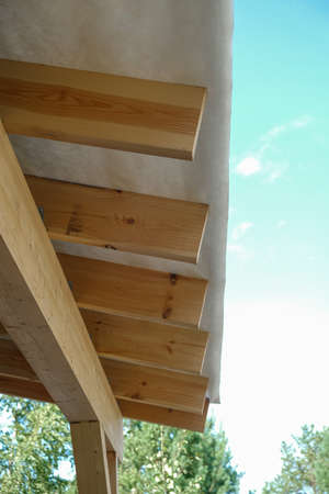 construction of a two-storey frame house outside the city