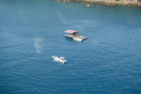 the fishing boats on the oceanの写真素材