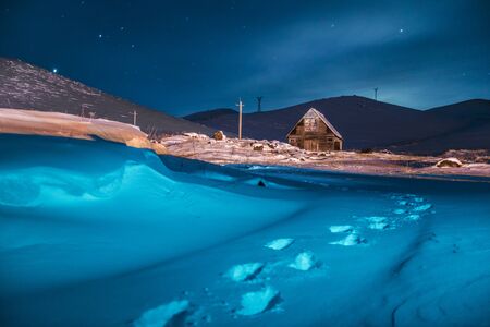 Lonely hut in winter nightのeditorial素材
