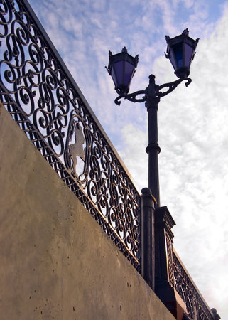 being single lantern on a bridge at middayの写真素材