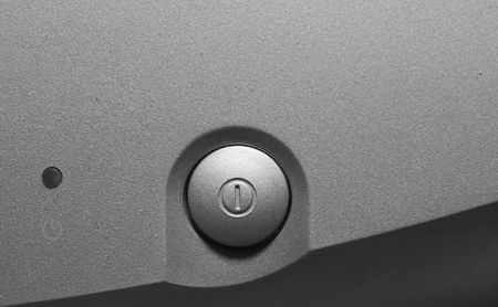 modern button of shutdown of technical means and equipment on a grey grain backgroundの写真素材