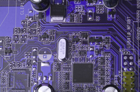 blue microcircuit with chip of condensers, resistors and transistors