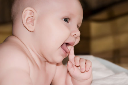 small child of few monthly age observes of the world new to it