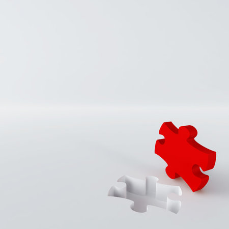 red puzzle in the corner of white surfaceの写真素材