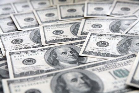 background from chaotically lyings one hundred greenbacks