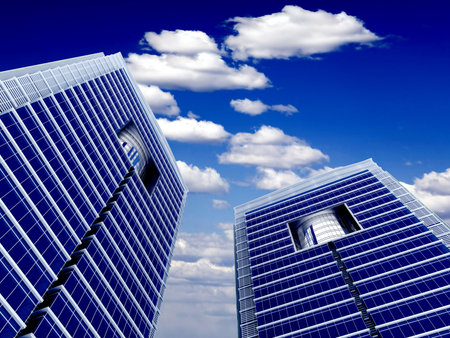 High modern skyscrapers on a background of the blue cloudy skyの写真素材