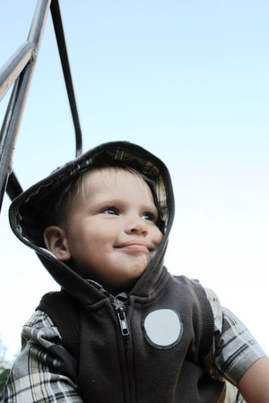 smiling baby boy is in casual clothingの写真素材