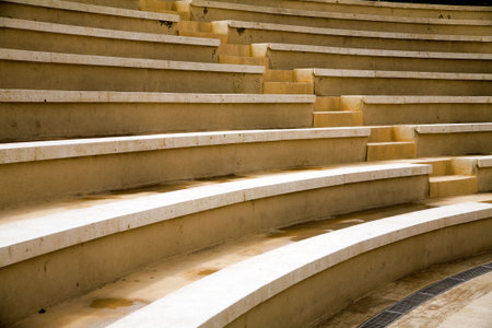 ancient stages and seats from a yellow granit stone