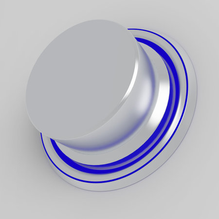 simple silver metallic button with the speck of lightの写真素材