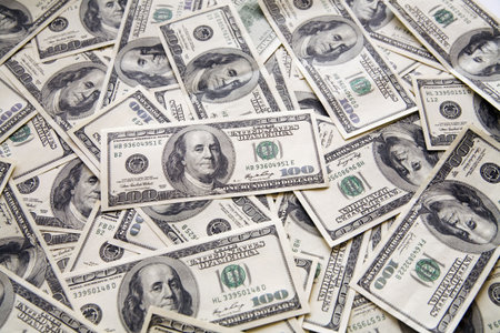 background from chaotically lyings one hundred greenbacks