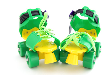 funny colored roller skates on white backgroundの写真素材