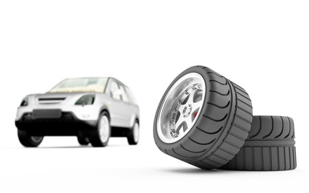 Two automobile wheels on a back background the carの写真素材