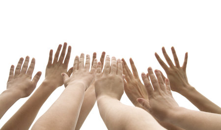 many female hands are lifted up on white backgroundの写真素材