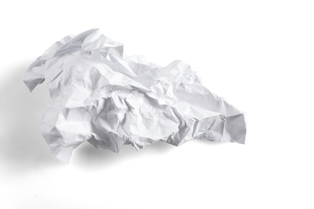 crumpled sheet of paper on a white background