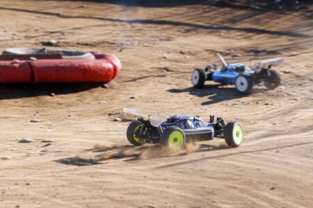 rc racing cars during off-road raceの写真素材