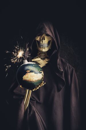 death knight hold earth planet during apocalypse dayの写真素材