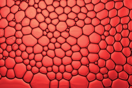 Macro foam texture red toned.の写真素材