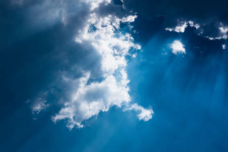 Sun rays on cloudy sky dramatic view