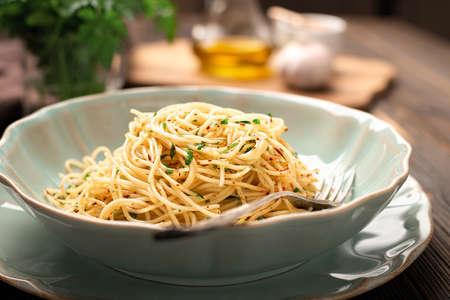 Close-up of a plate of spaghetti AGLIO E OLIOの写真素材