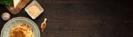 PASTA with BREADCRUMBS Like an Italian (Pasta Ca 'Muddica) and ingredients with copy space banner