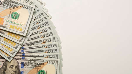 One hundred dollar bills with free space for textの写真素材
