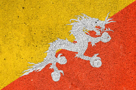 State flag of Bhutan on a plastered wallの写真素材