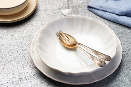 Empty plate with cutlery on the table. high angle view.の写真素材