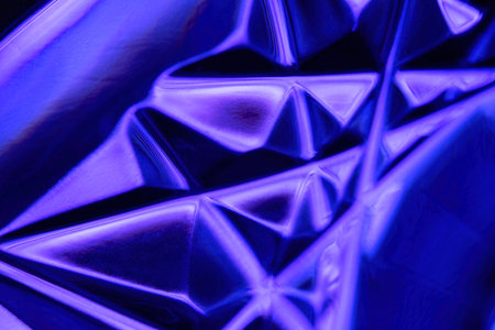 abstract background. A shot of an illuminated embossed glass surface.の写真素材