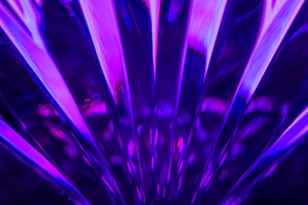 abstract background. A macro shot of an illuminated embossed glass surface.の写真素材